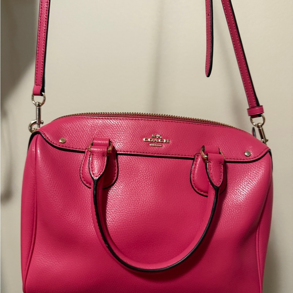 Pink vintage ish coach purse.